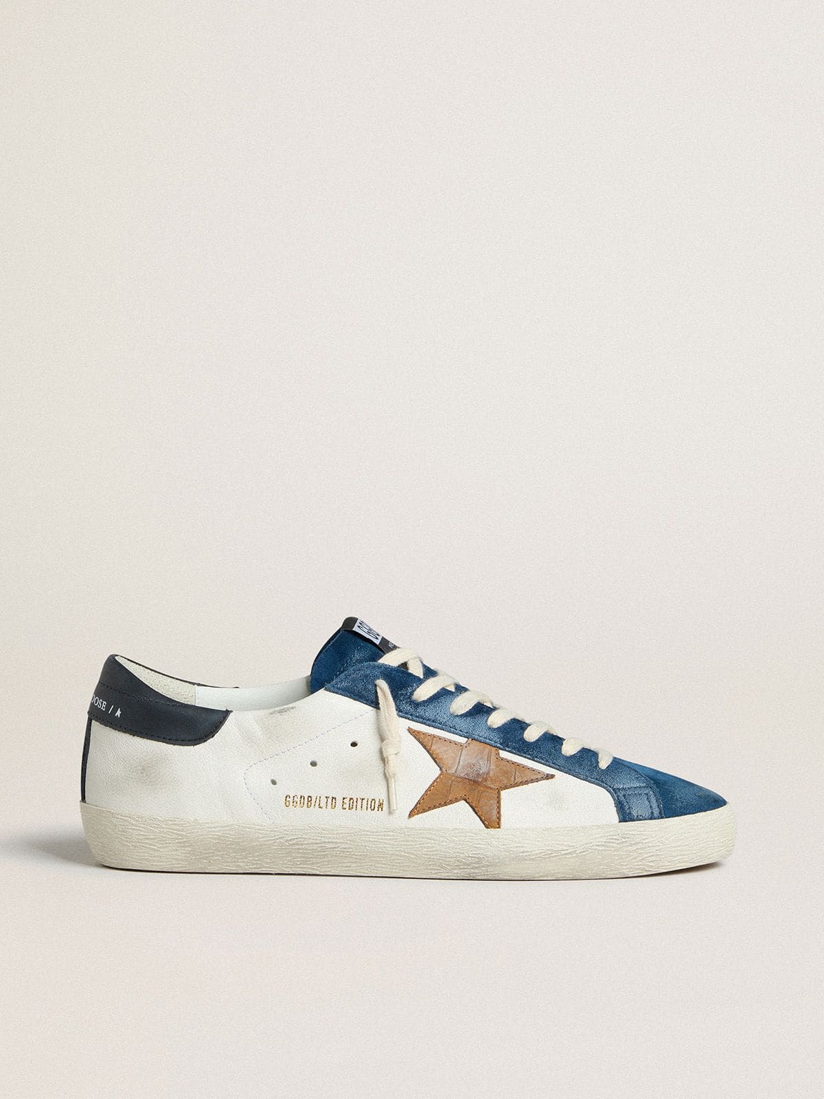 Super-Star LTD with tobacco-colored croc-print leather star and black leather heel tab