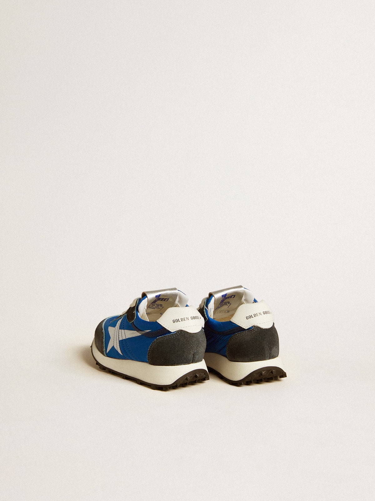 Marathon Young in blue nylon with printed star and leather heel tab