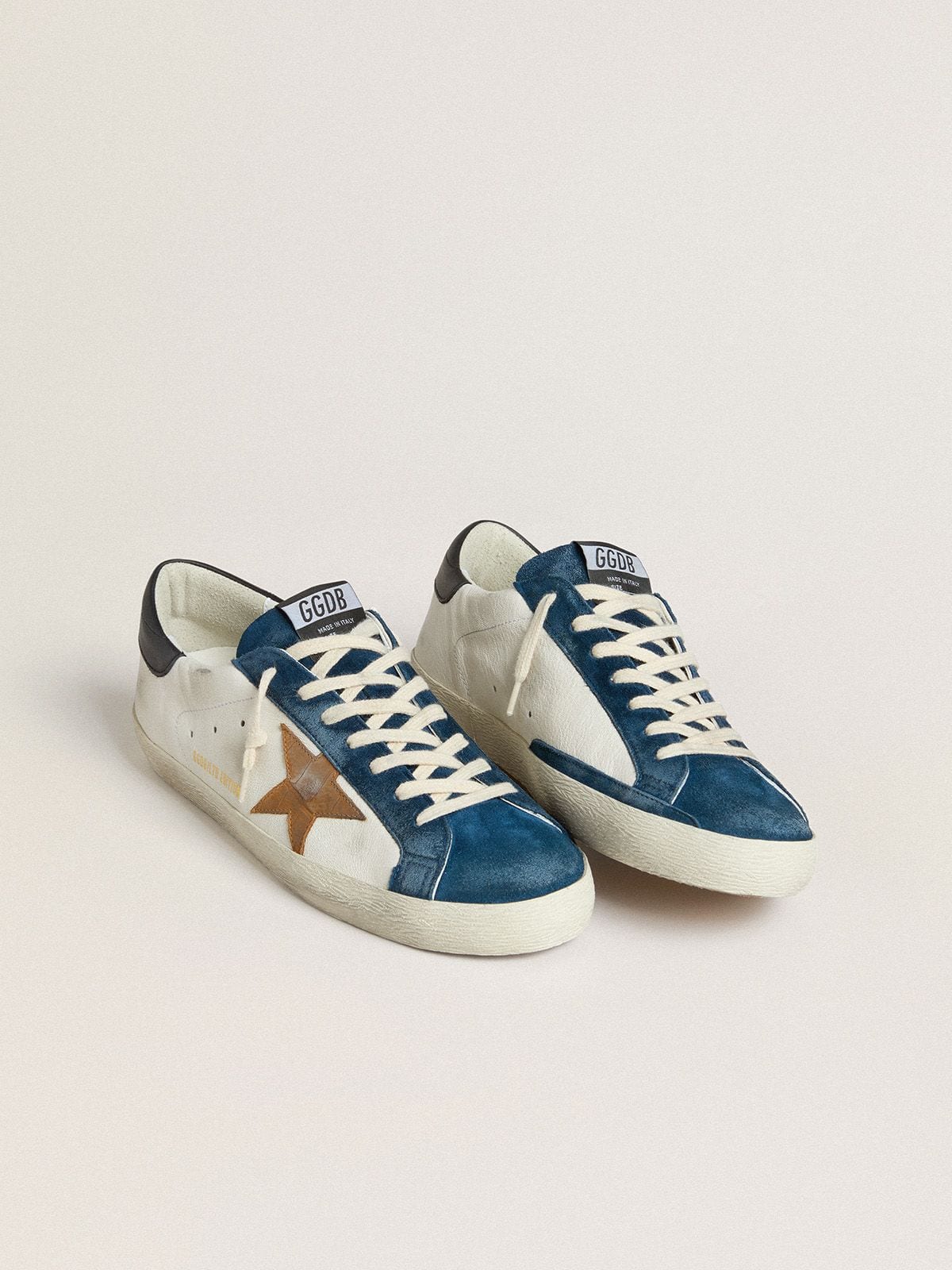 Super-Star LTD with tobacco-colored croc-print leather star and black leather heel tab