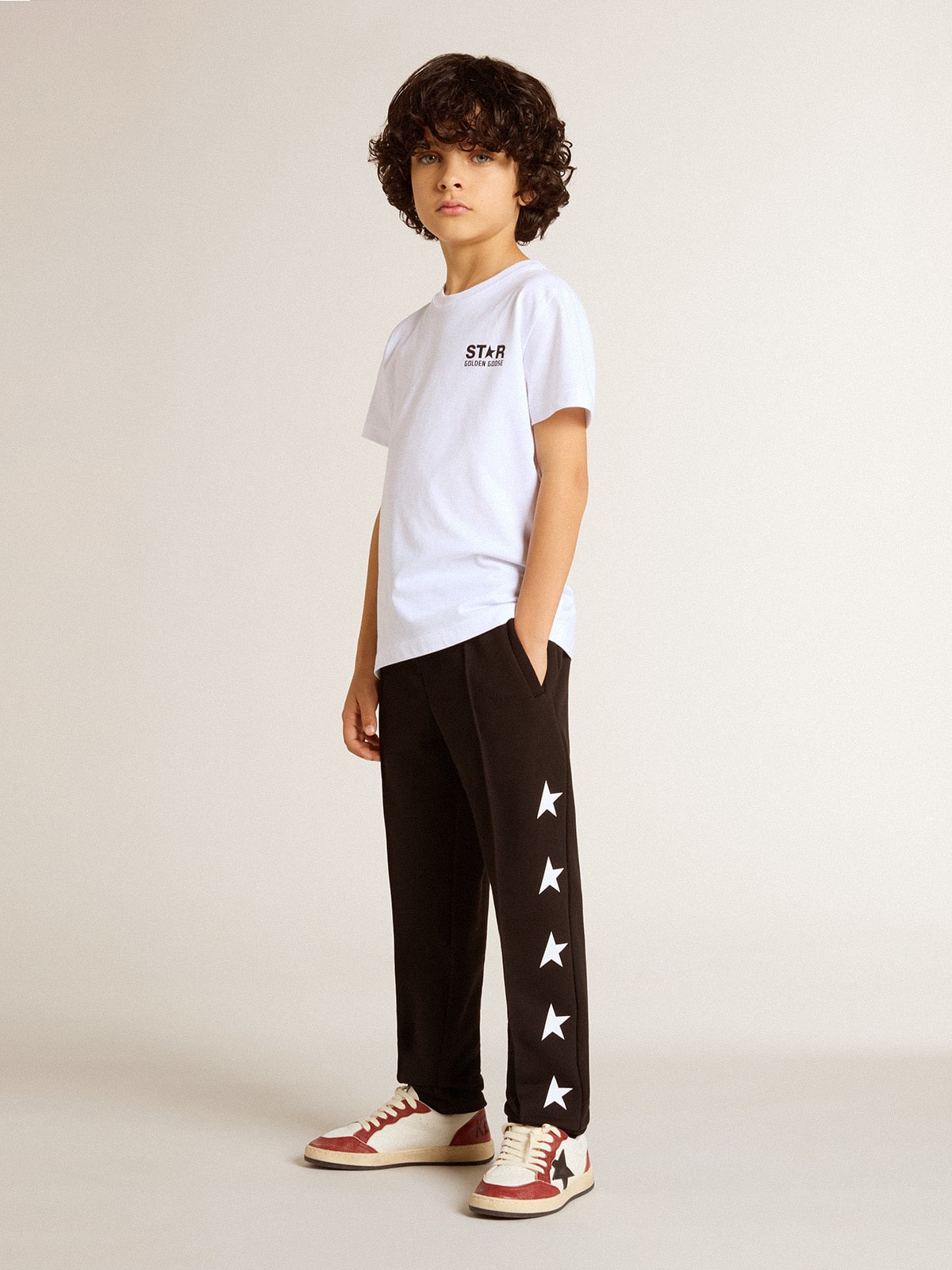 Boys’ black joggers with white stars
