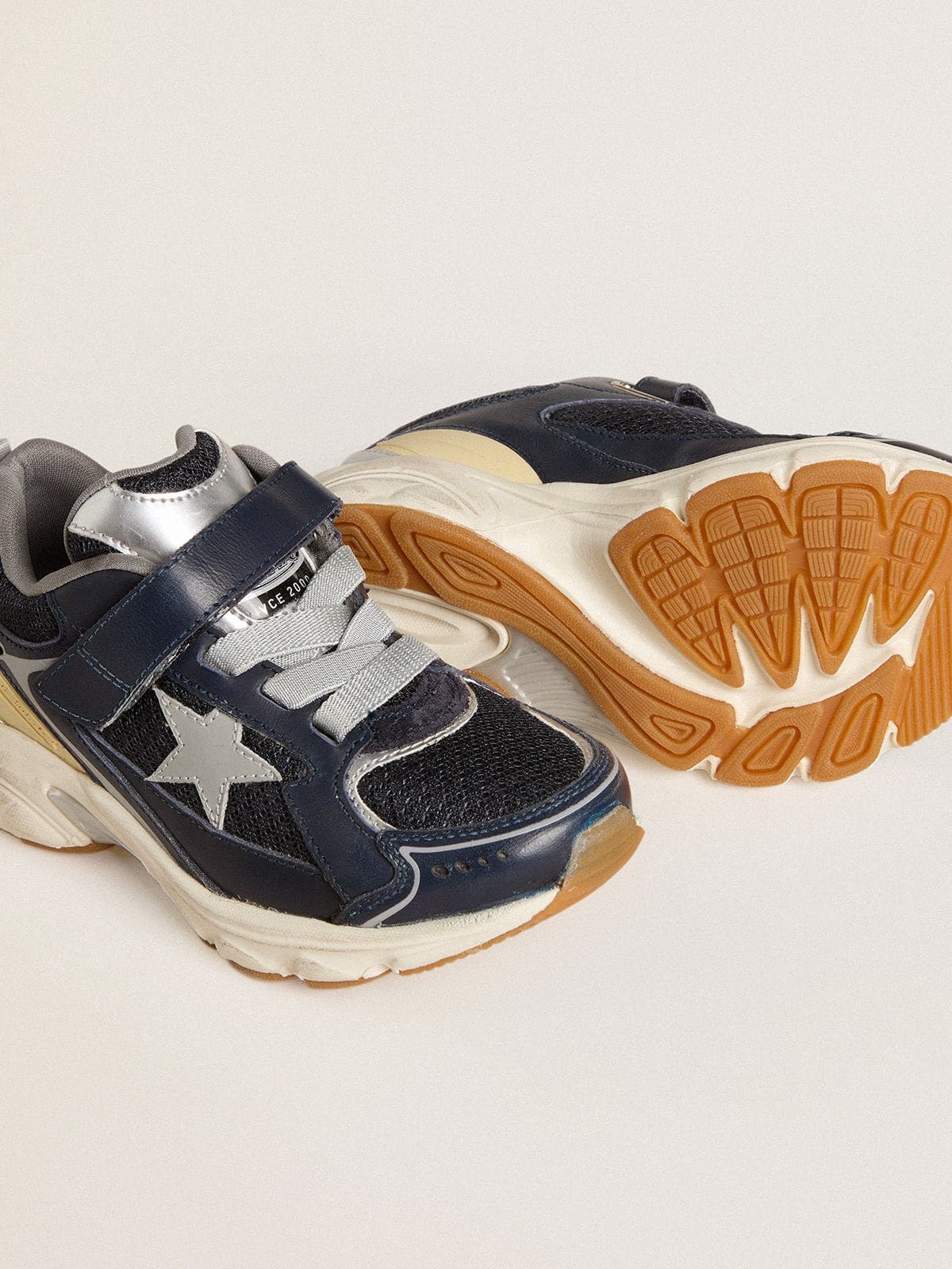 Young Lightstar in blue leather and mesh with gray leather star