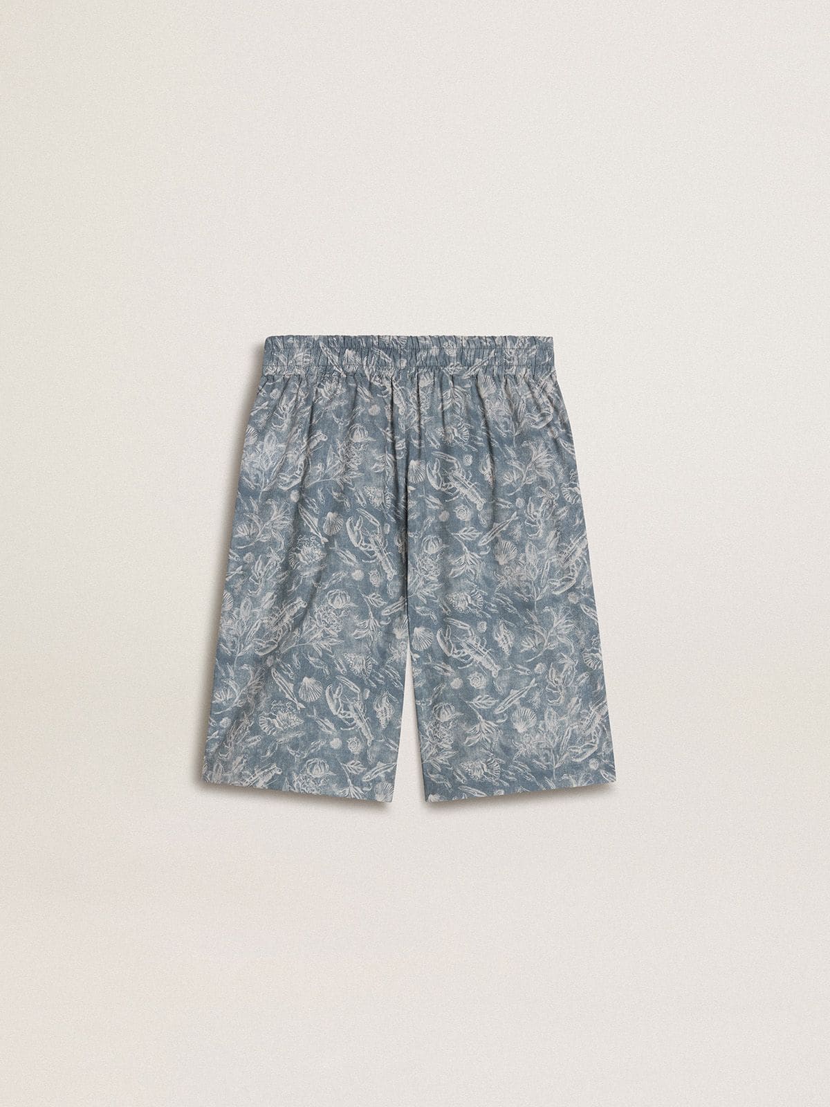 Boys’ blue shorts with white print