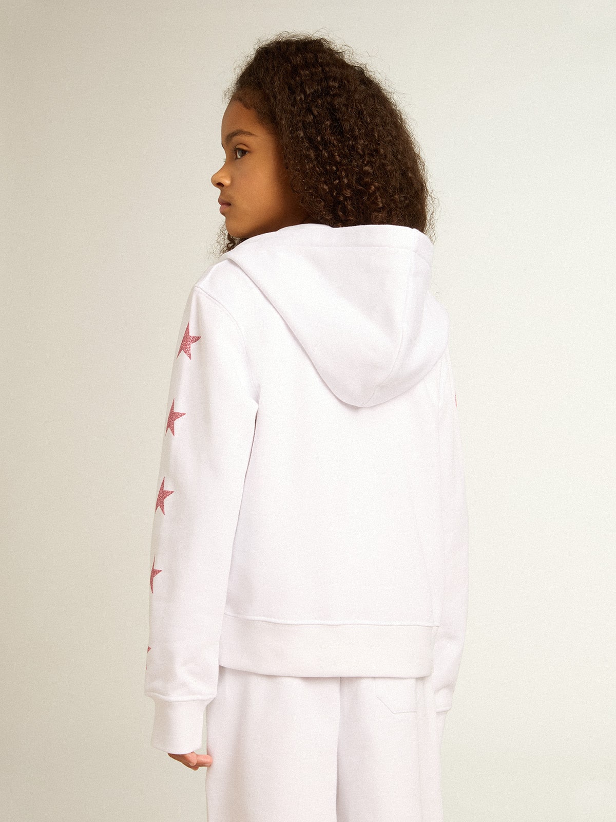 Girls’ zip-up sweatshirt in white with glitter stars on the sleeves
