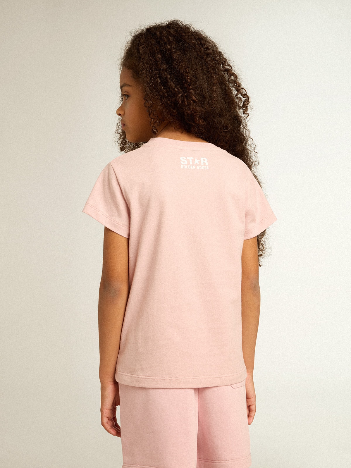 Girls’ pink T-shirt with white logo and maxi star