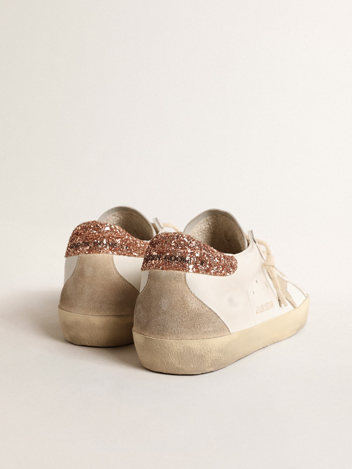Women's Super-Star with a suede star and peach-pink glitter heel tab