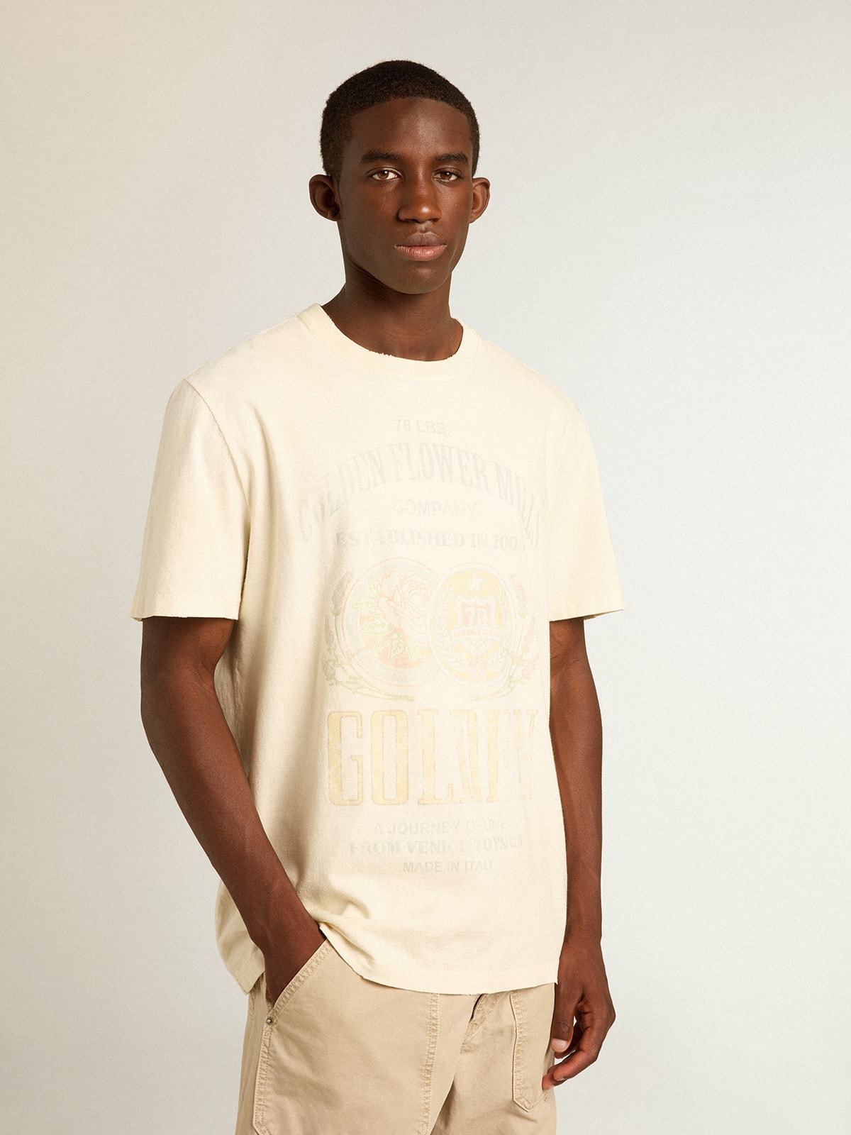 Men’s aged white cotton T-shirt with print on the front