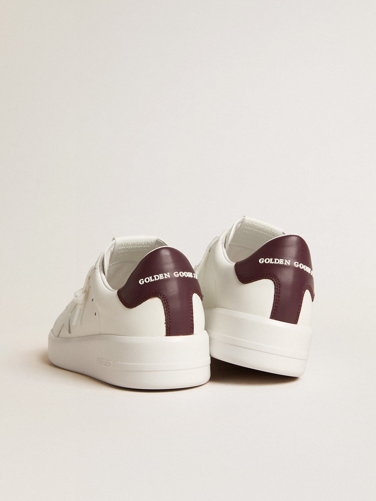 Purestar with white leather star and plum leather heel tab