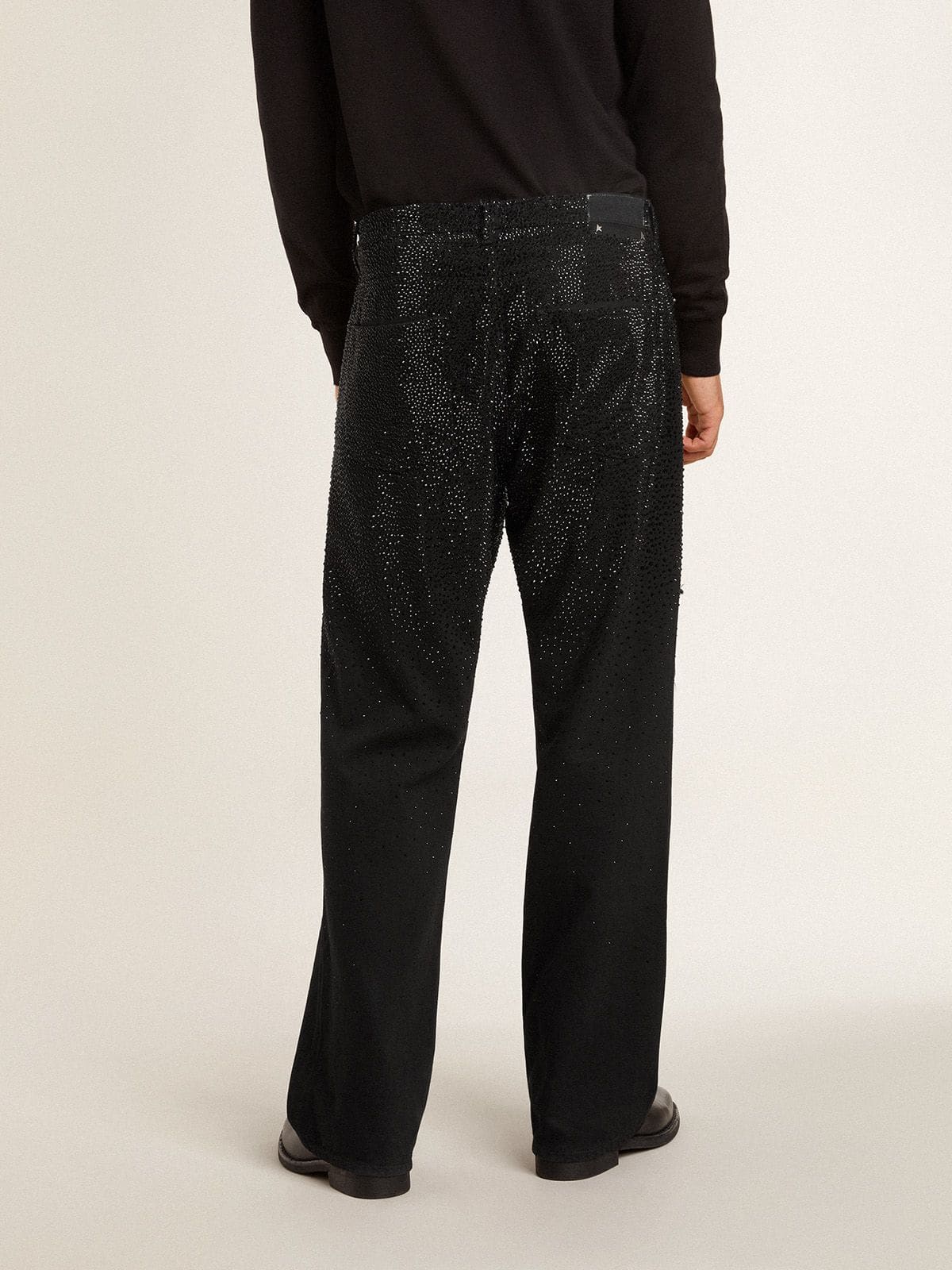 Men's black jeans with a loose fit and gradient effect all-over crystals