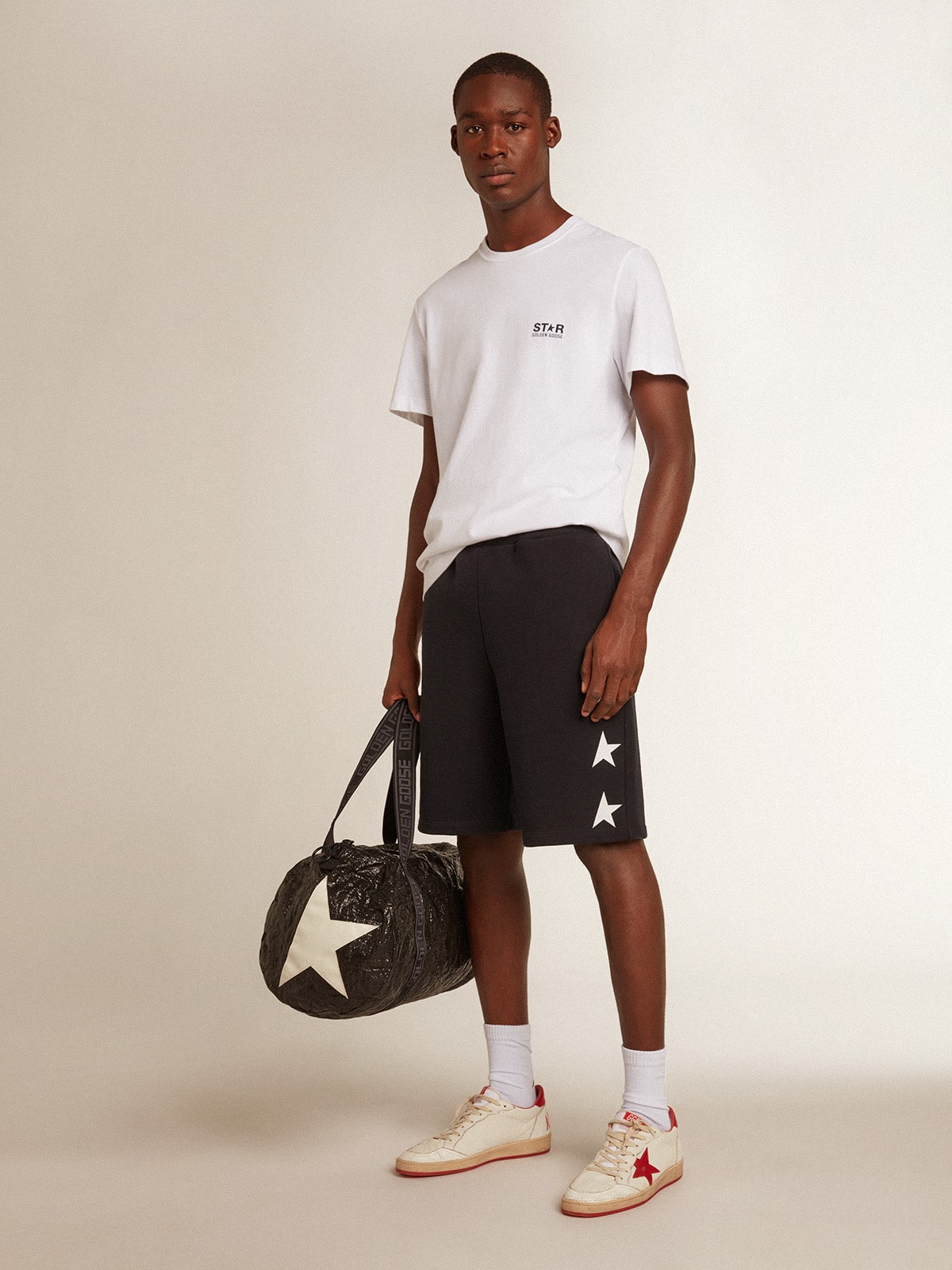 Men’s white T-shirt with dark blue star on the back