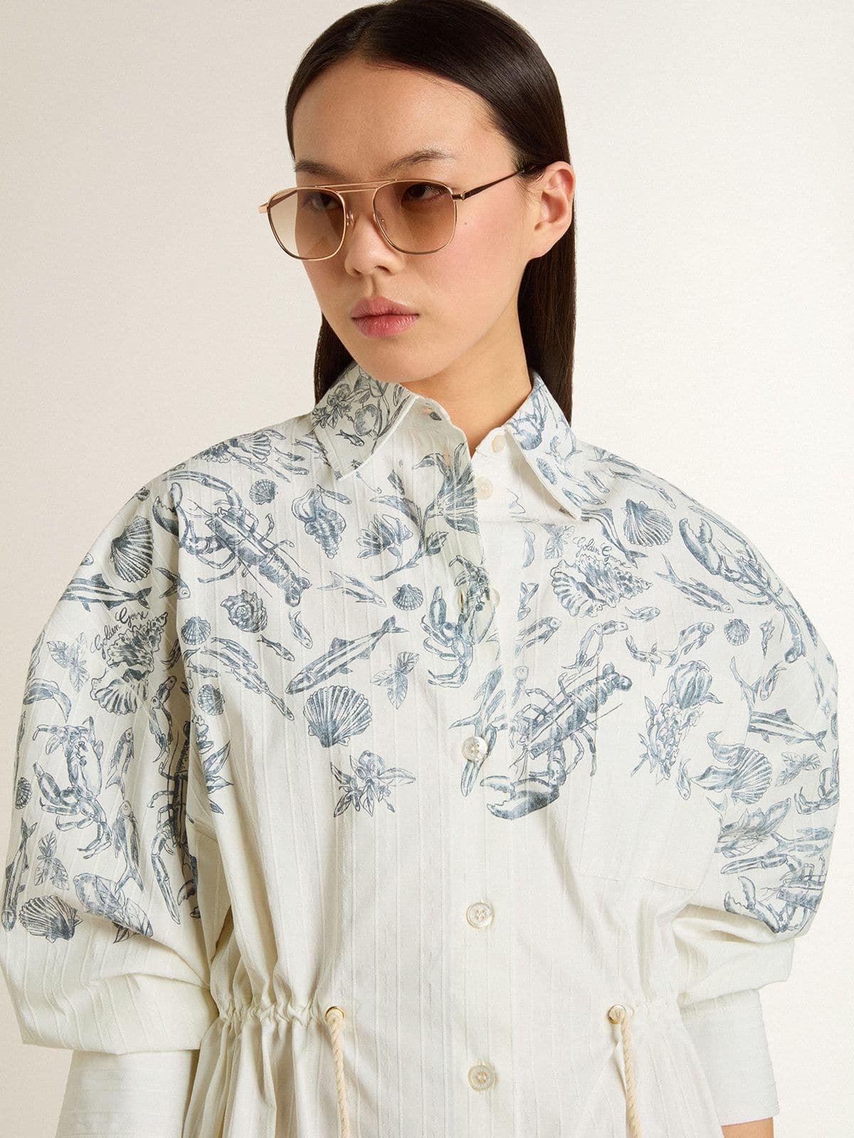 Women's short shirt dress in white striped cotton with a blue marine print