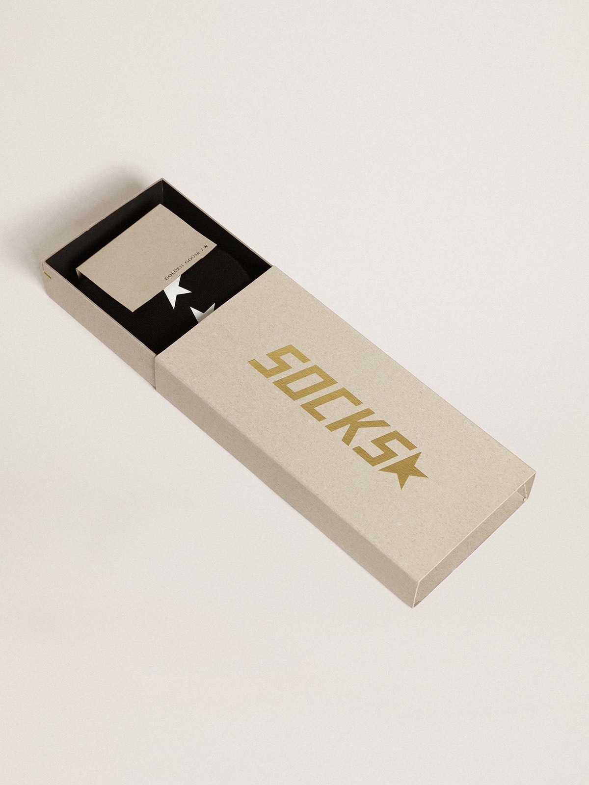 Black socks with contrasting white stars