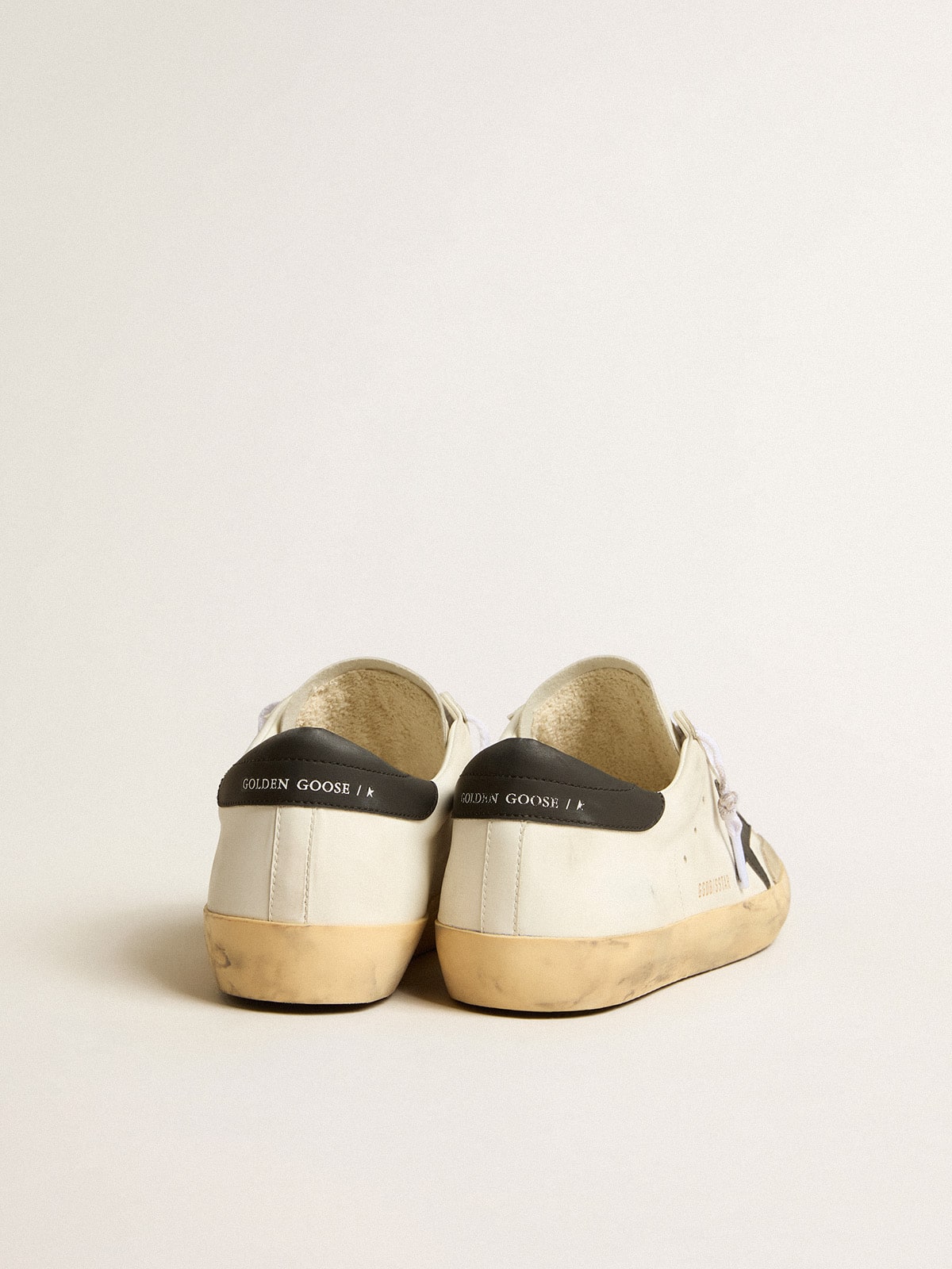 White bio-based men's Super-Star with black star and heel tab