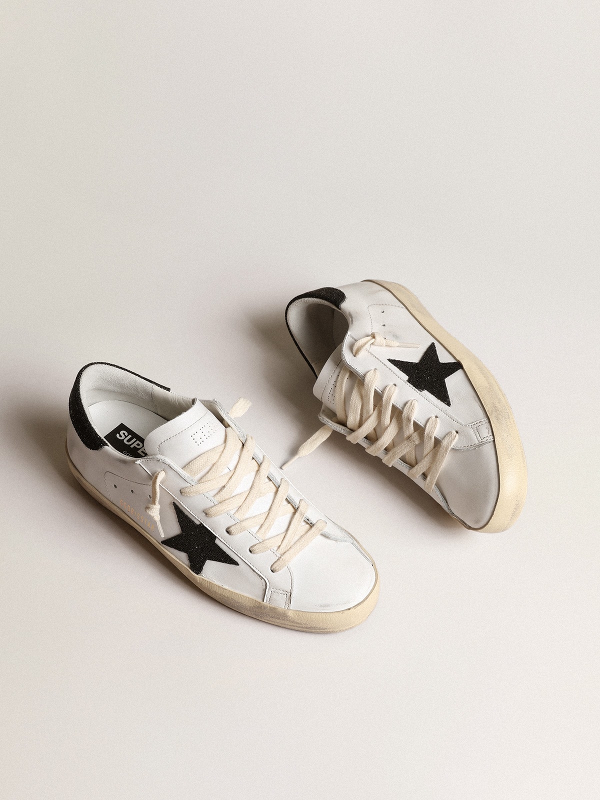 Women’s Super-Star with a black Swarovski crystal star and heel tab