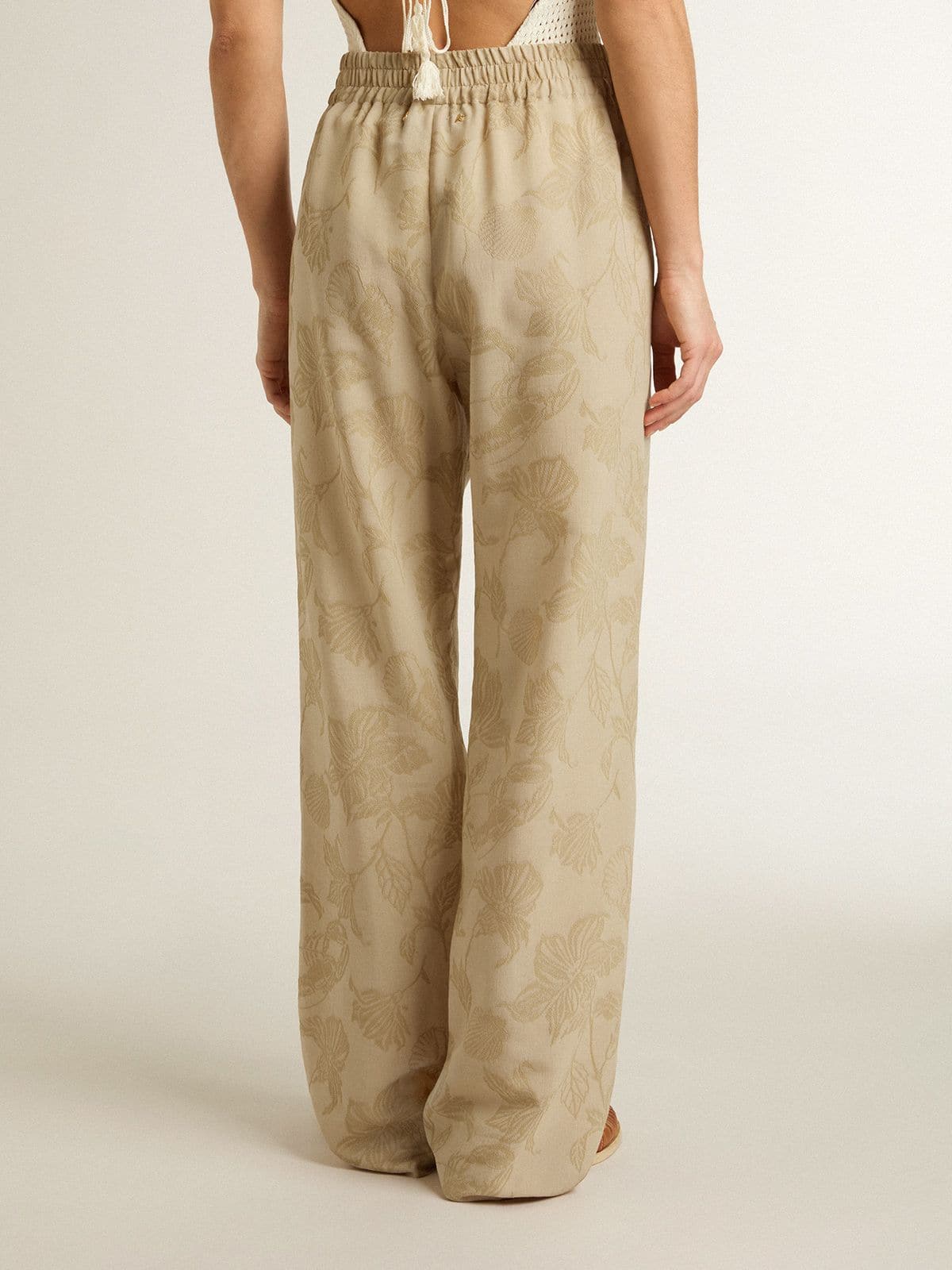 Women's pajama pants in beige jacquard with floral pattern