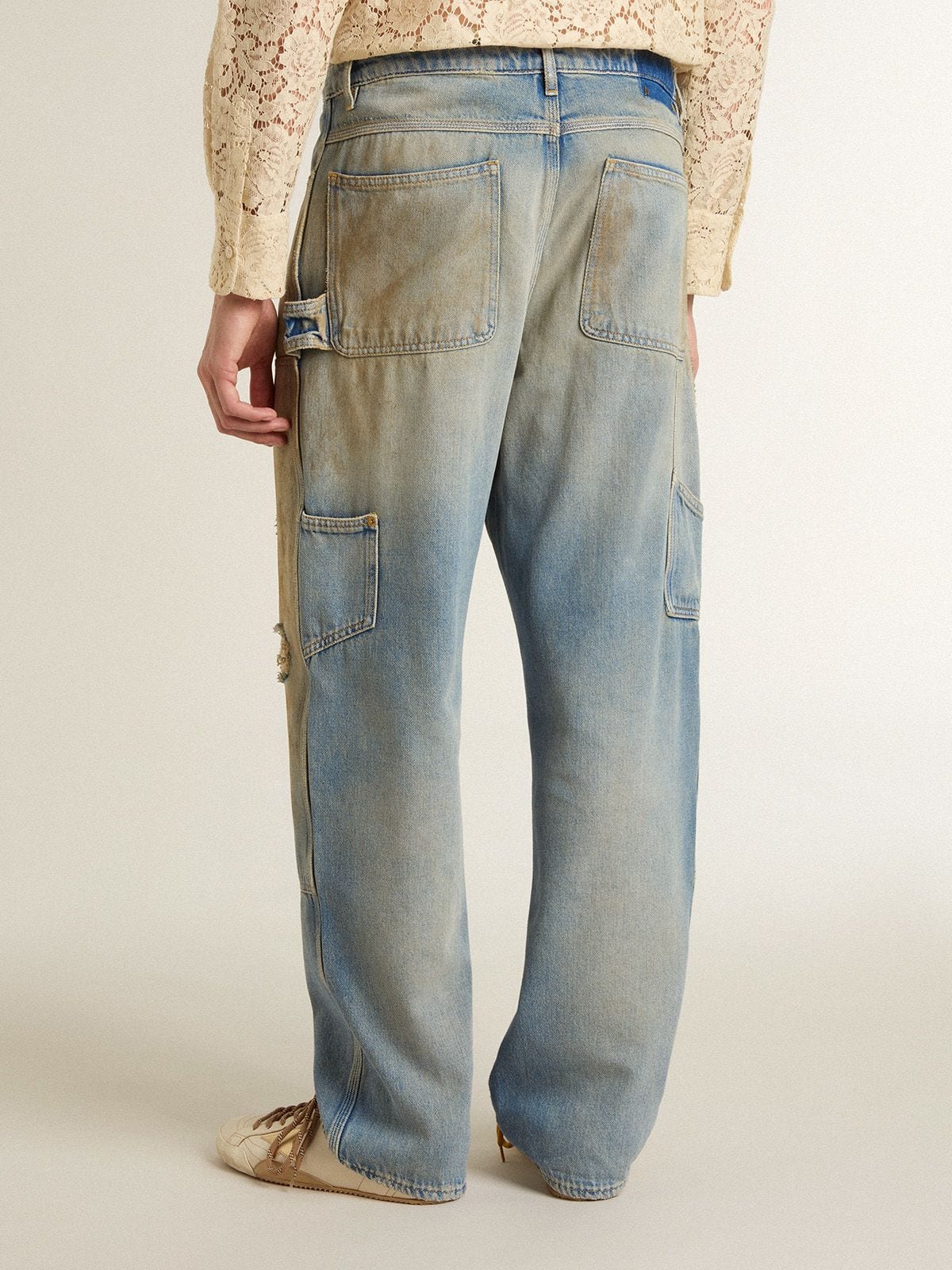Men's distressed sand-washed jeans