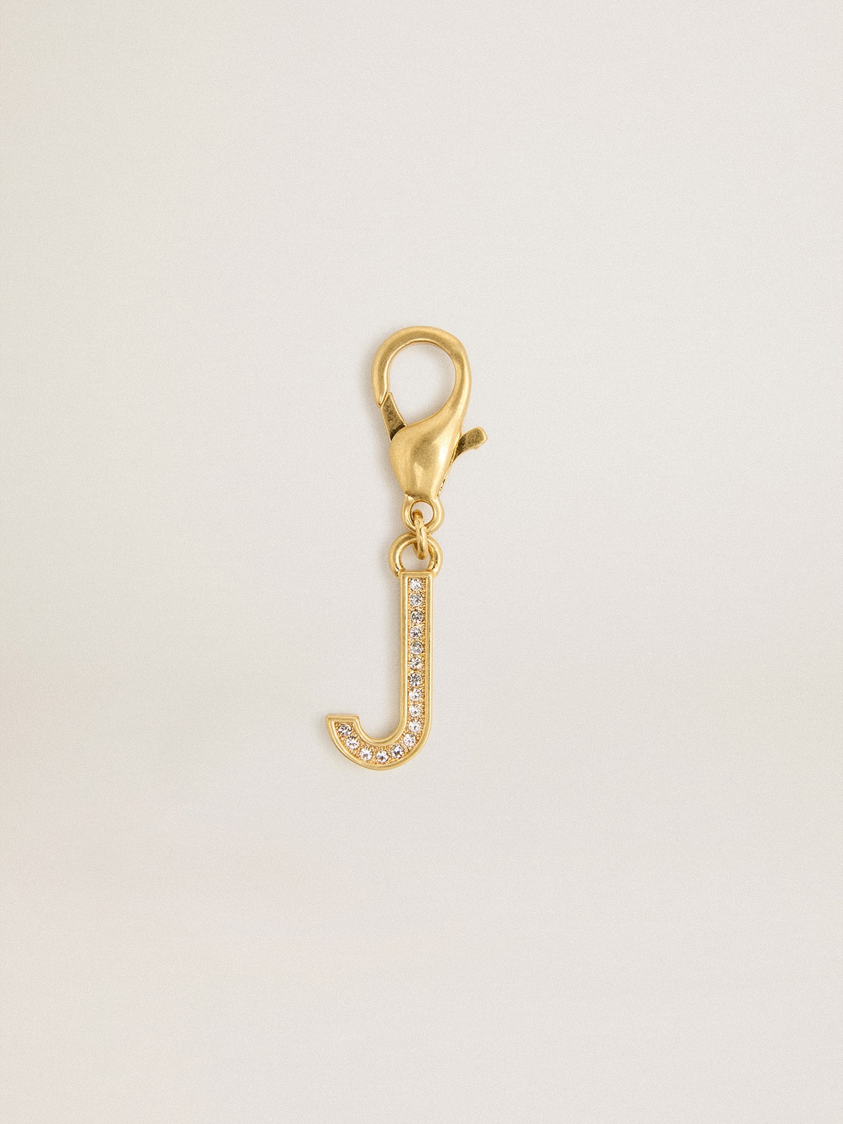 Letter J charm in gold-colored brass with crystals