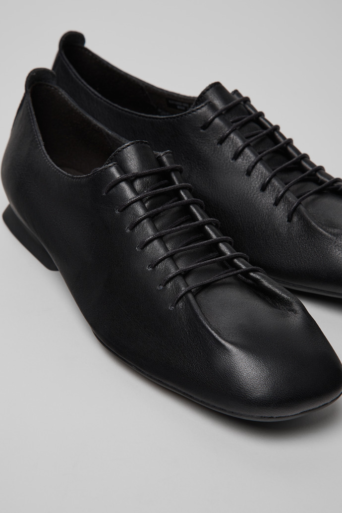 Casi Myra Black Leather Shoes for Women.