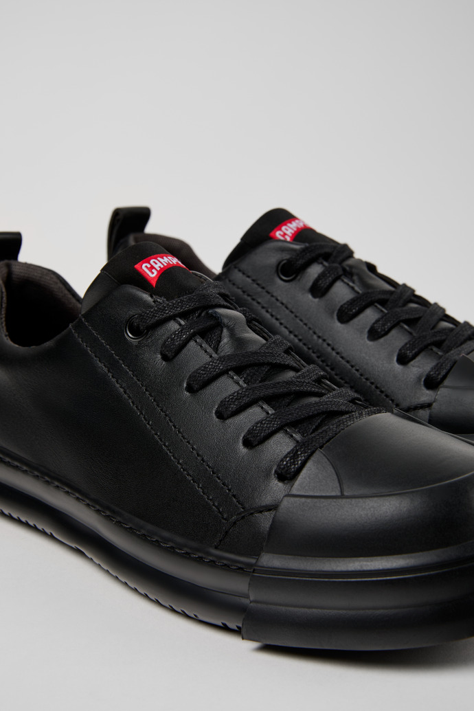 Junction Runner Black Leather Sneakers for Women.