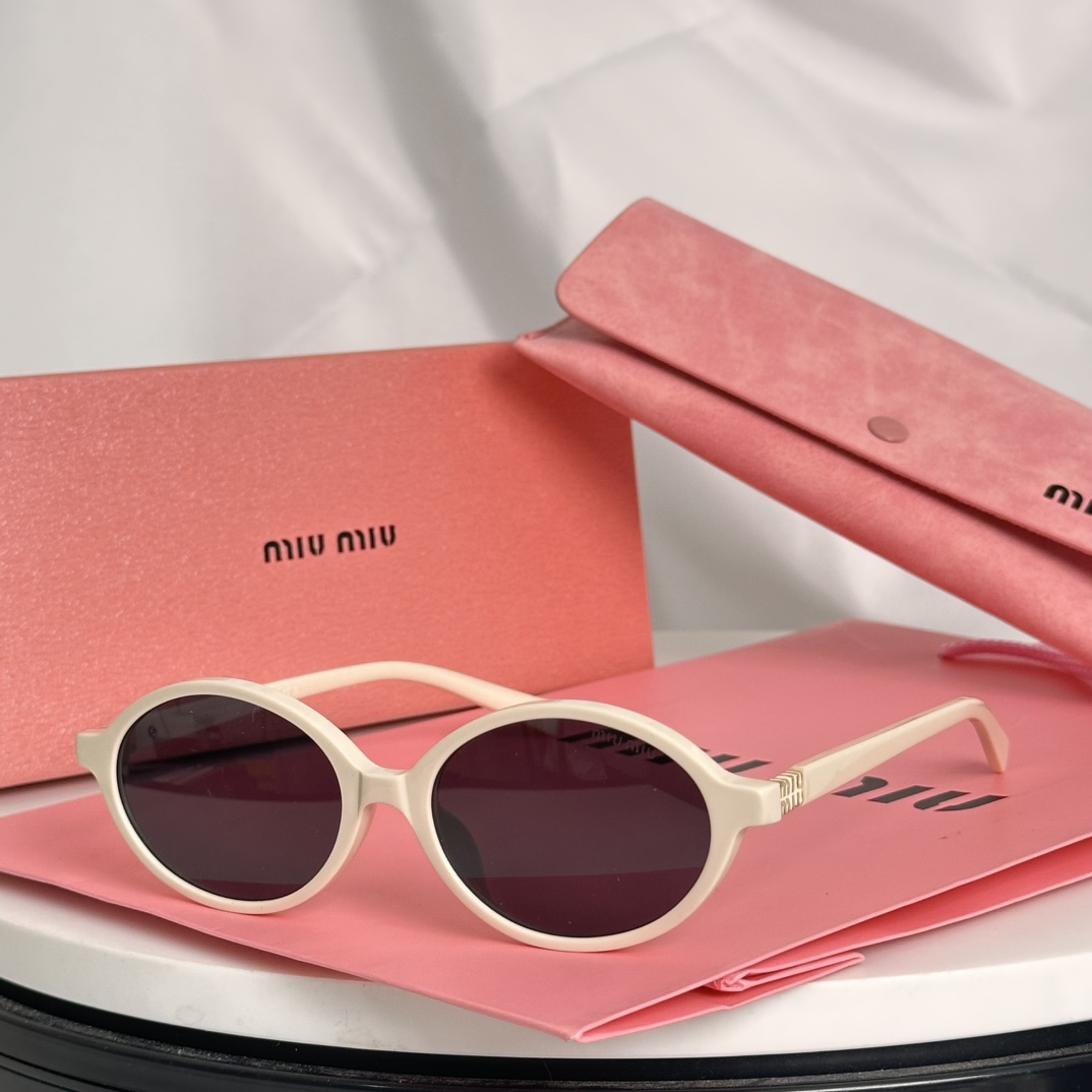 Miu Miu Sunglasses SMU04Z SM011