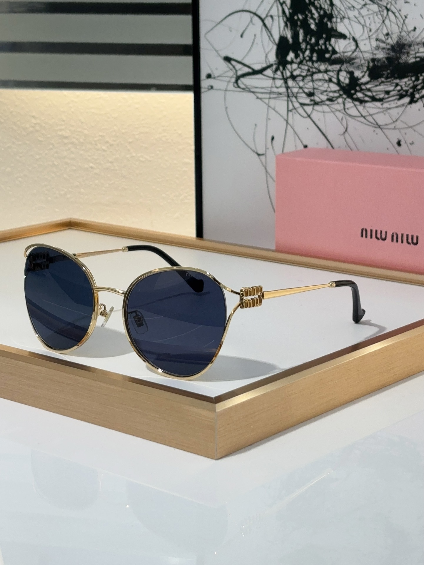 MiuMiu Sunglasses