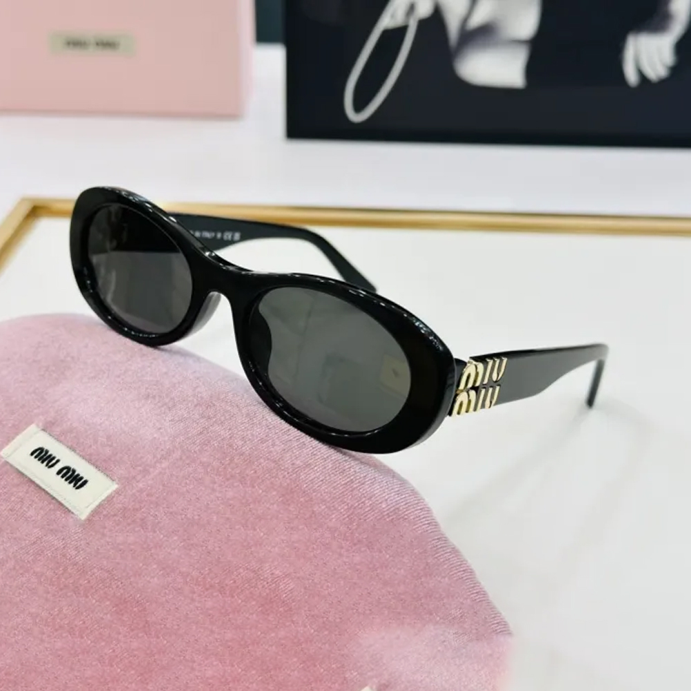 Miu Miu Sunglasses SMU06Z SM021