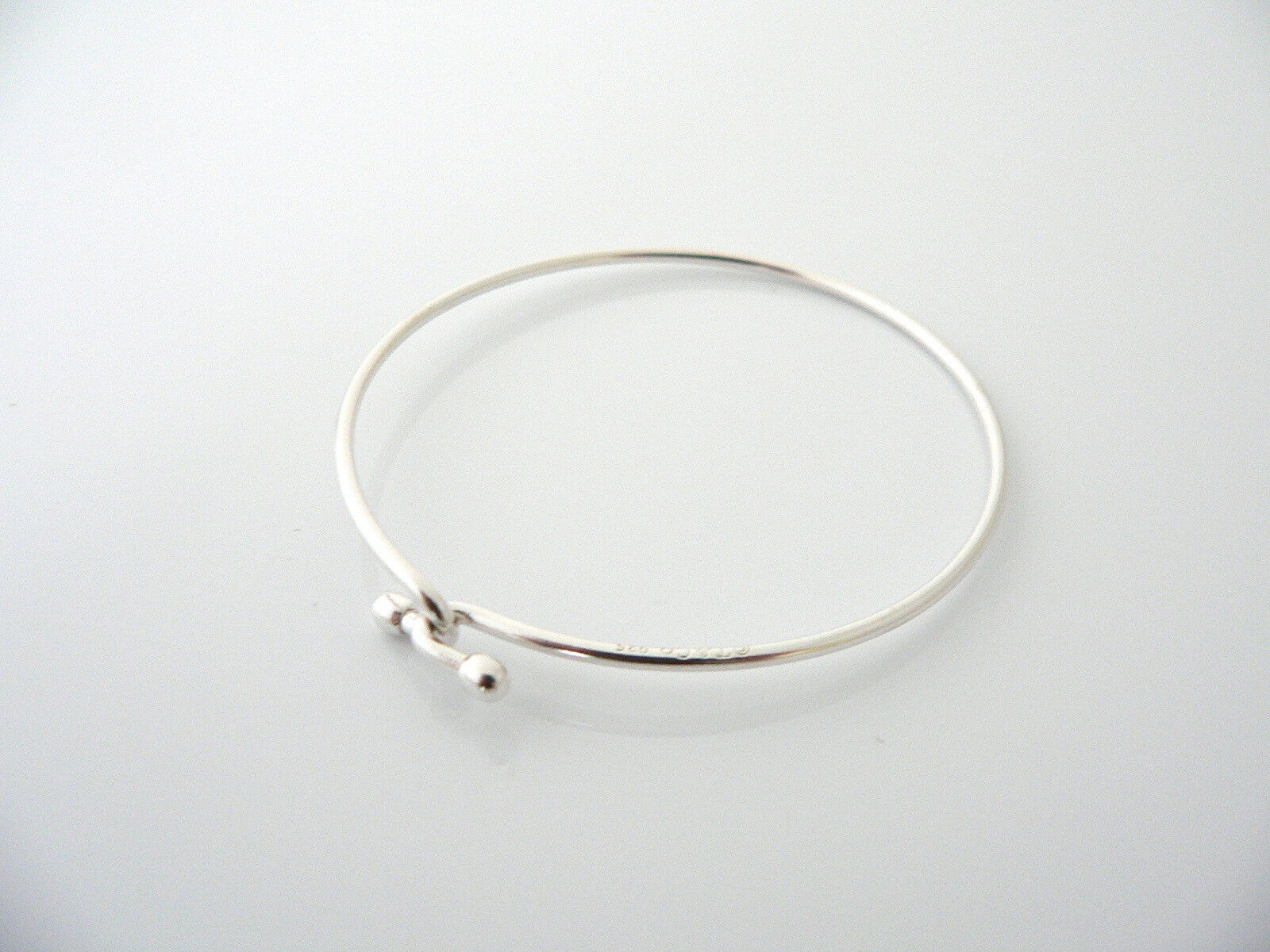 Tiffany & Co Silver Love Knot Hook Bangle Bracelet Infinity Interlocking Gift