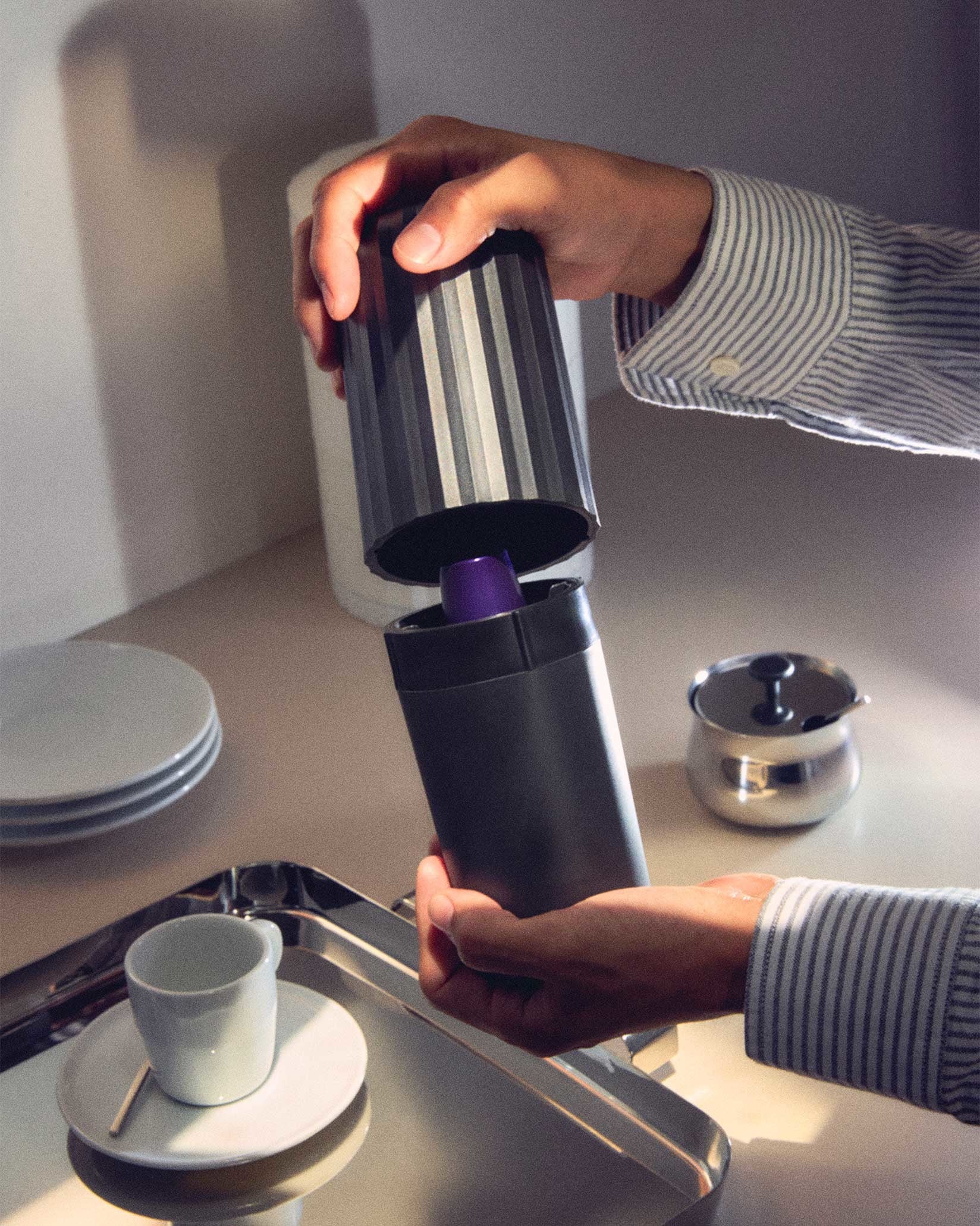 Plissé Capsule crusher Design Michele De Lucchi