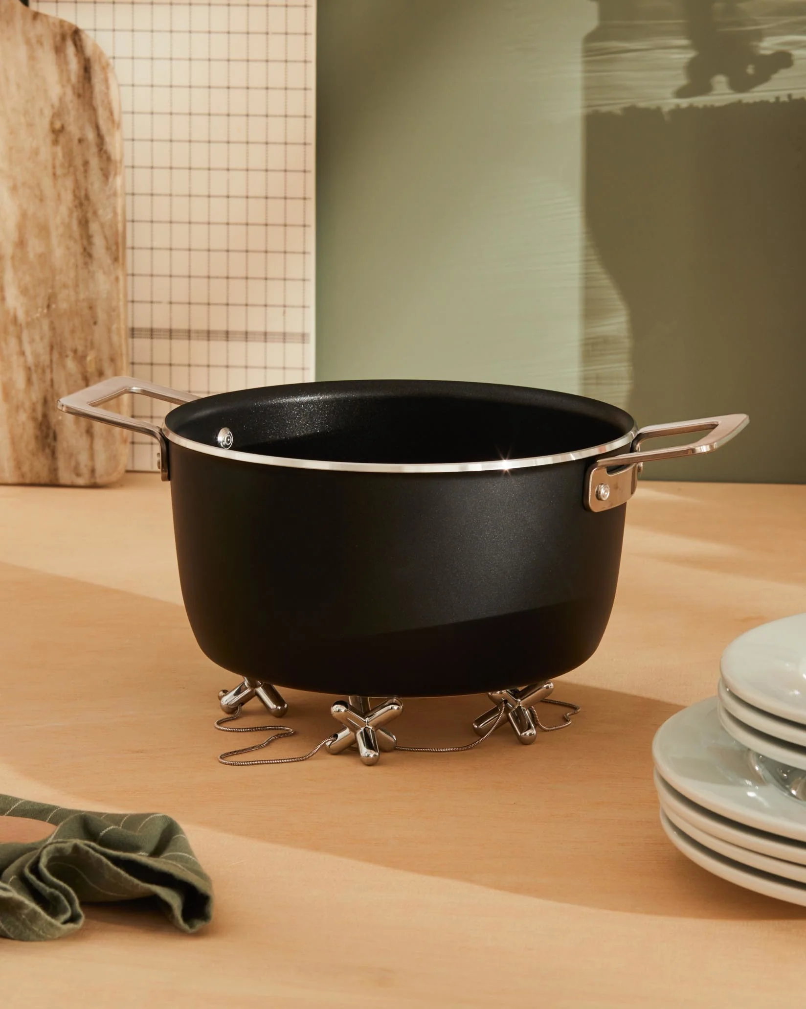 tripod Trivet with adjustable elements Design Gabriele Chiave, LPWK