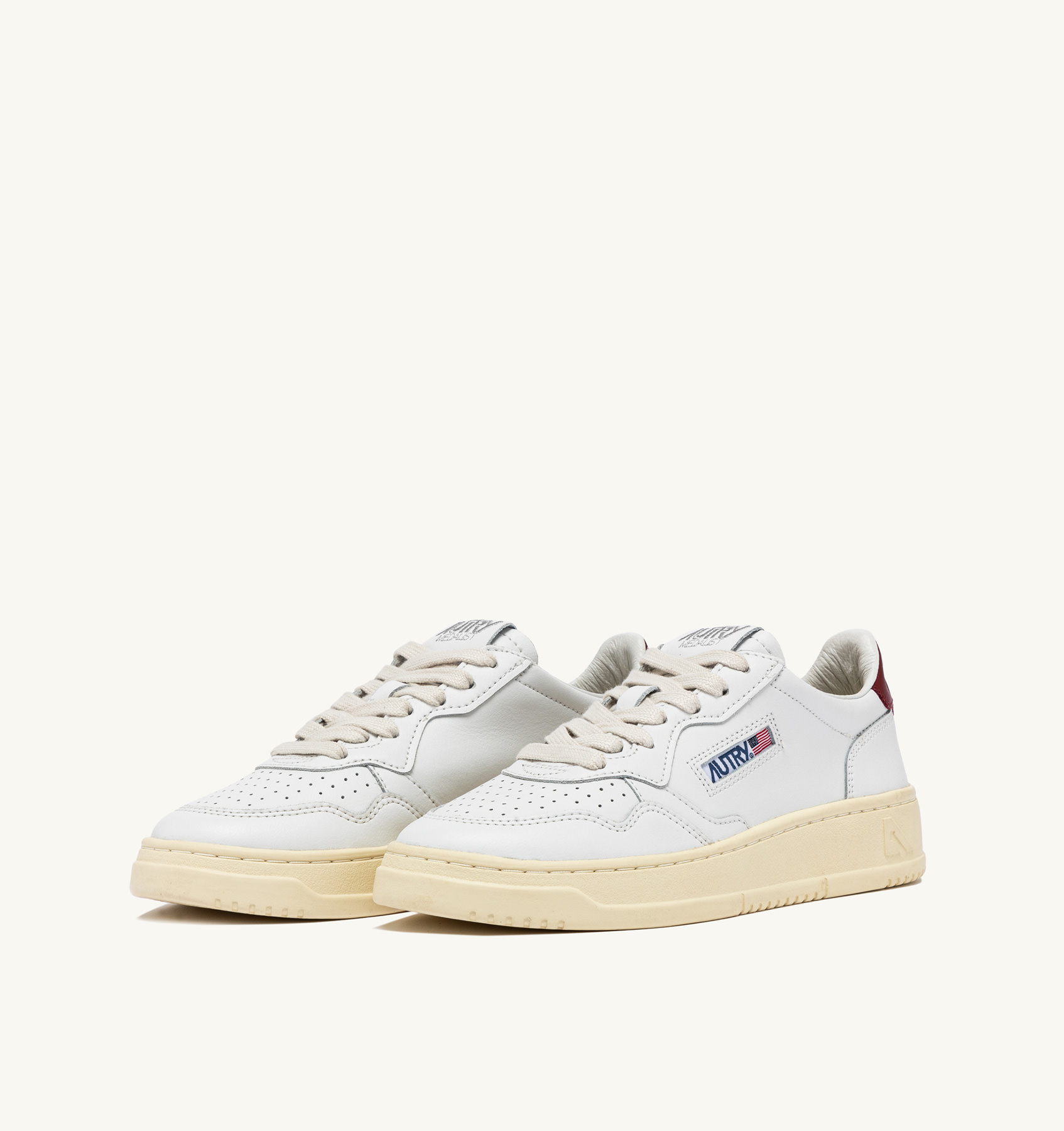 MEDALIST LOW SNEAKERS IN WHITE AND SYRAH LEATHER