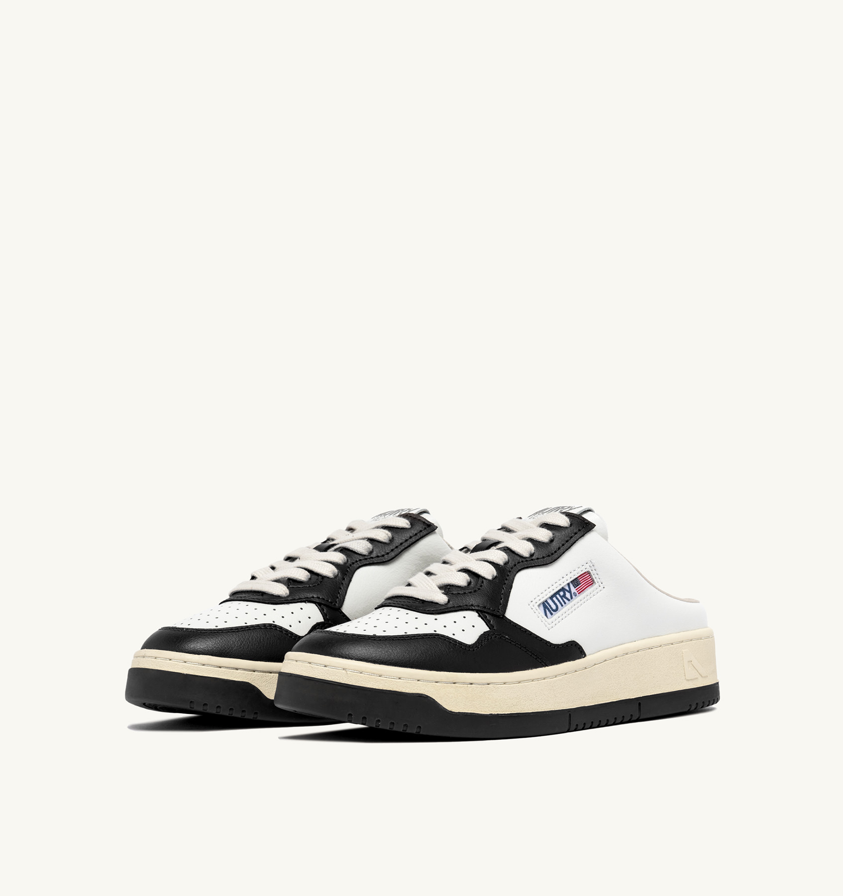 MEDALIST SABOT SNEAKERS IN WHITE AND BLACK LEATHER