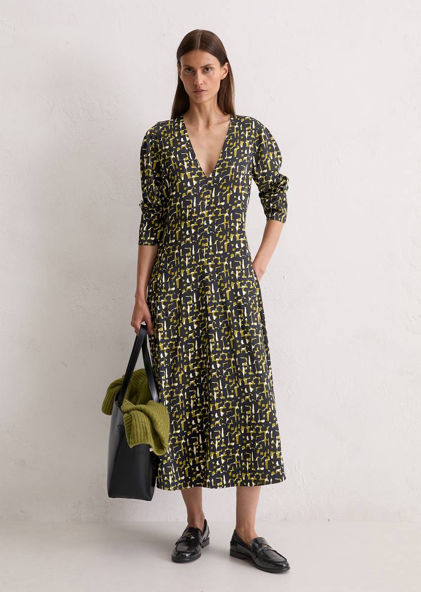 Dress shaped made from viscose stretch satin