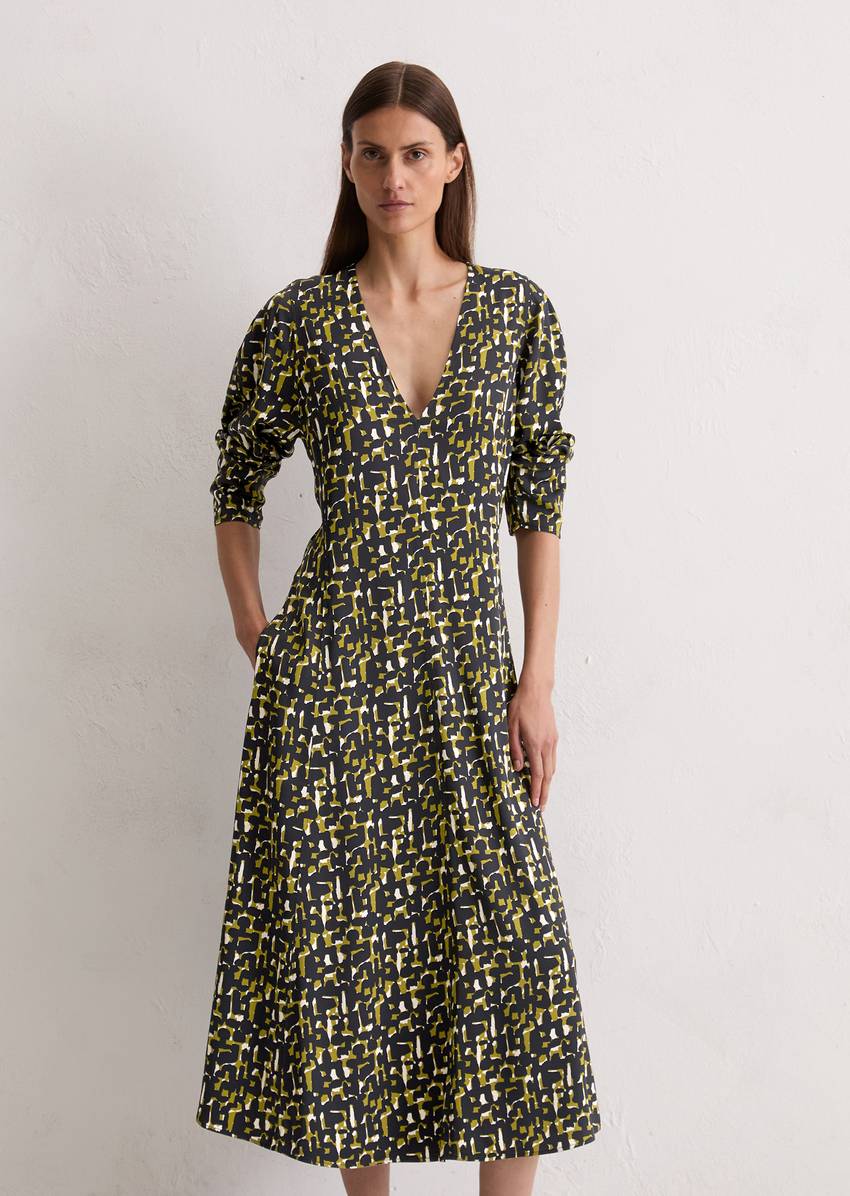 Dress shaped made from viscose stretch satin