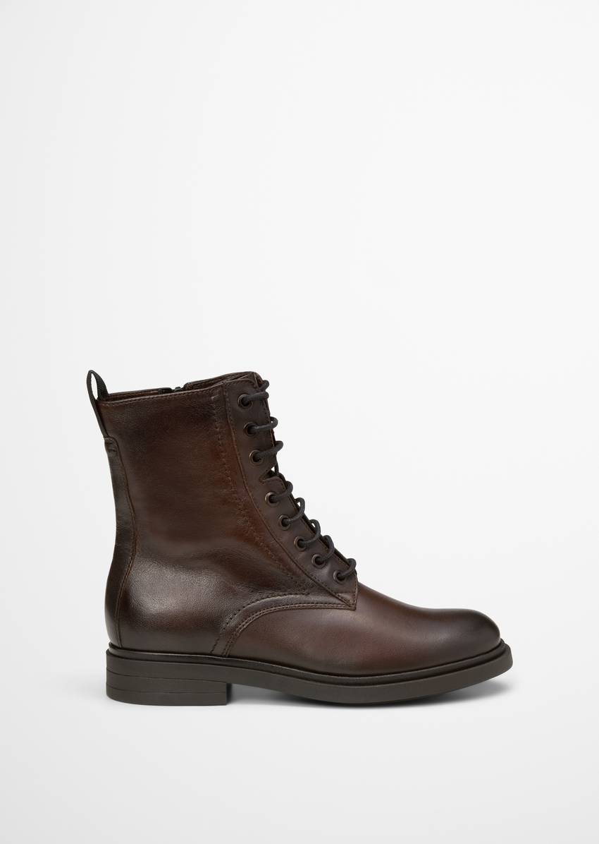 Lace-up boots with practical inside zipper