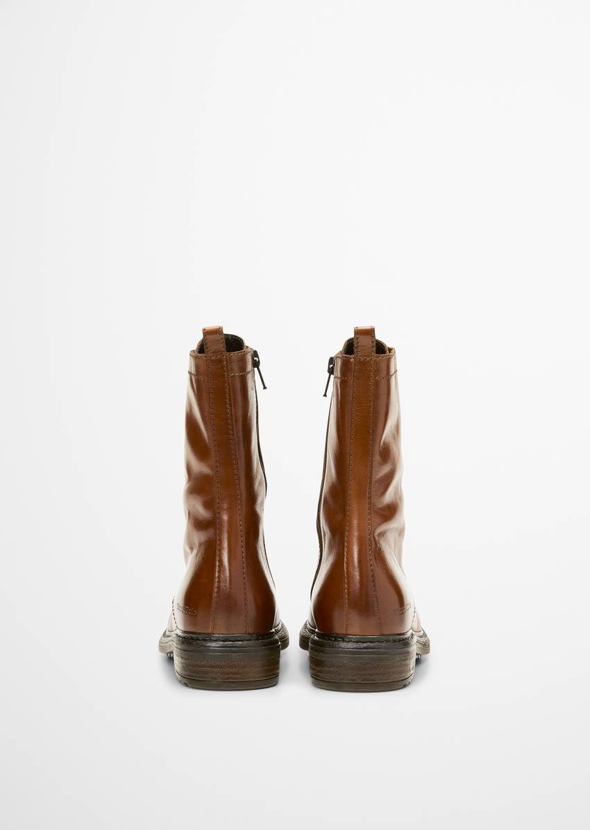 Lace-up boots with practical inside zipper