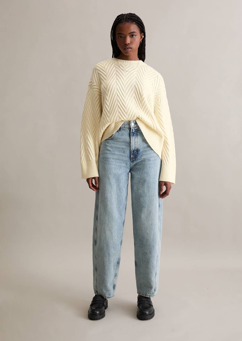 Relaxed knit sweater made from a soft virgin wool blend