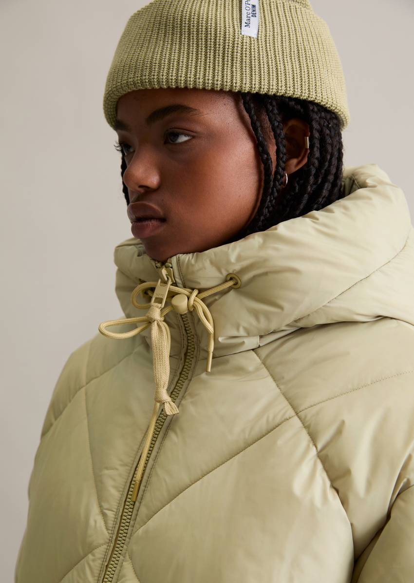 Long hooded quilted jacket relaxed made from recycled polyester