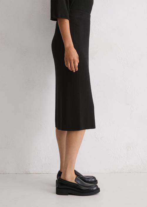 Rib knit skirt shaped made from a soft virgin wool blend