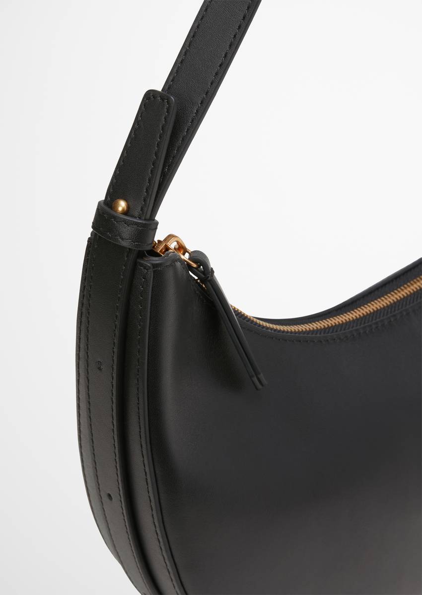 Crossbody bag small made from fine cowhide