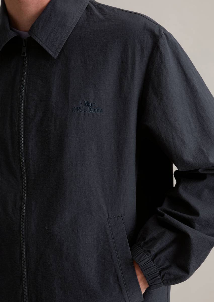Coach jacket made from a textured organic cotton blend