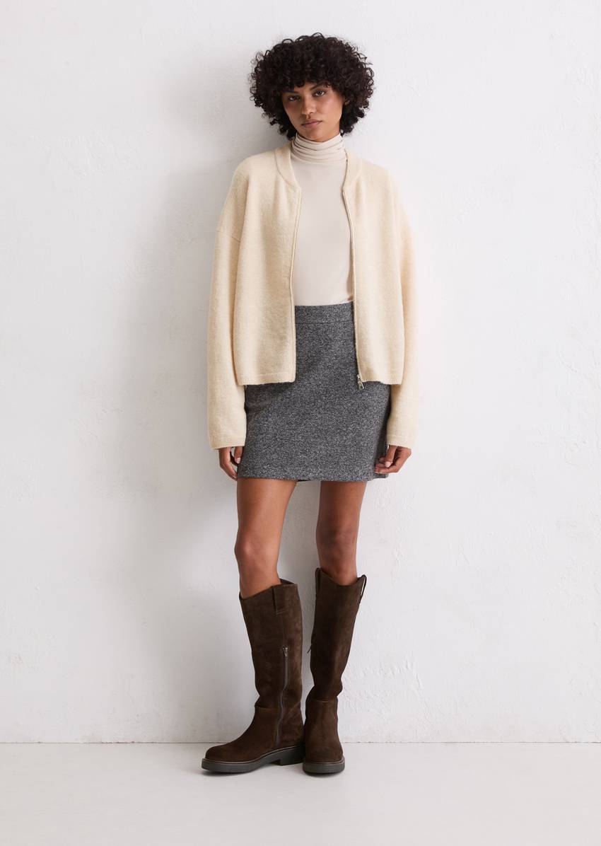 Knitted blouson loose made from a virgin wool/alpaca wool mix