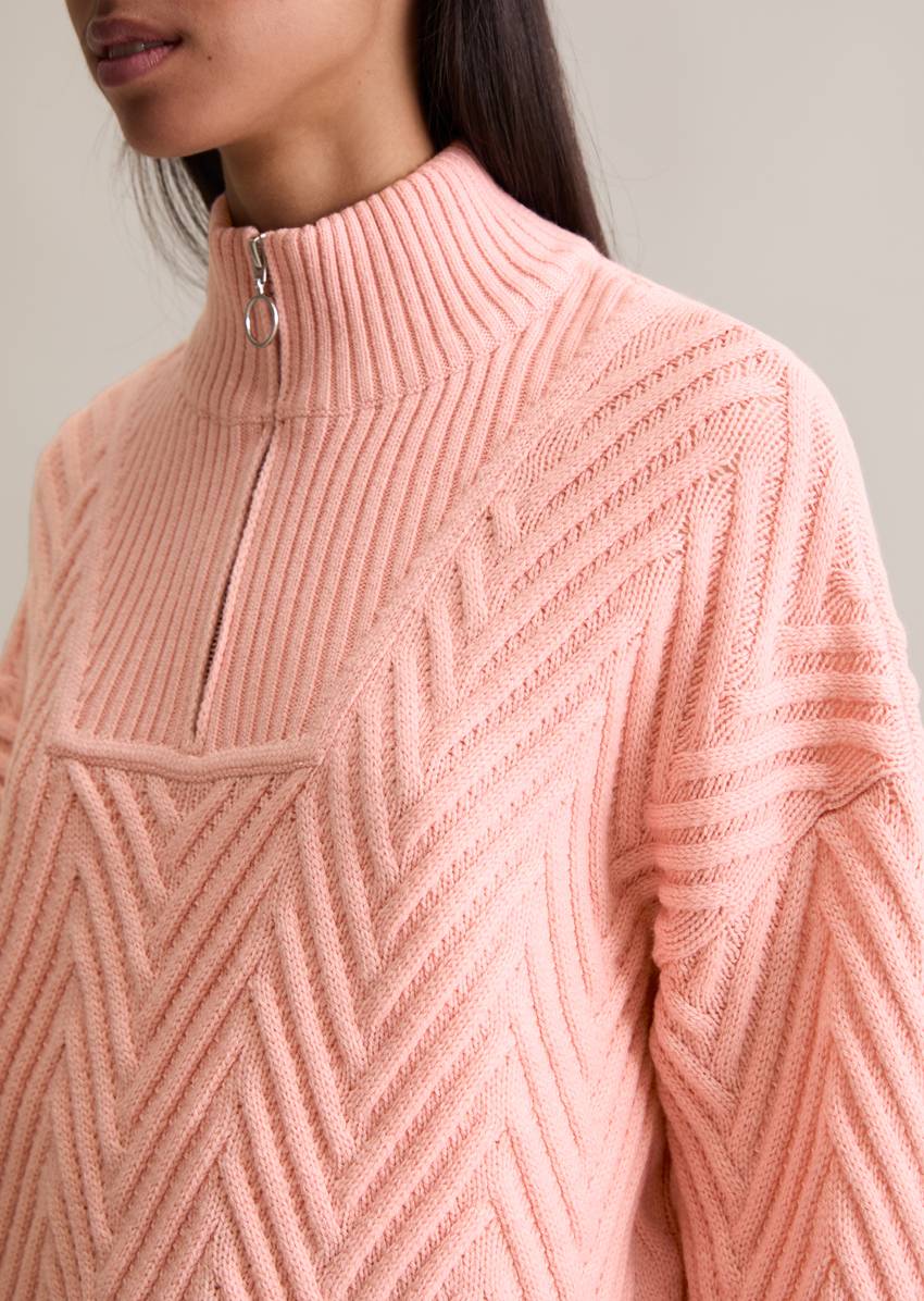 Relaxed knit troyer made from a soft virgin wool blend