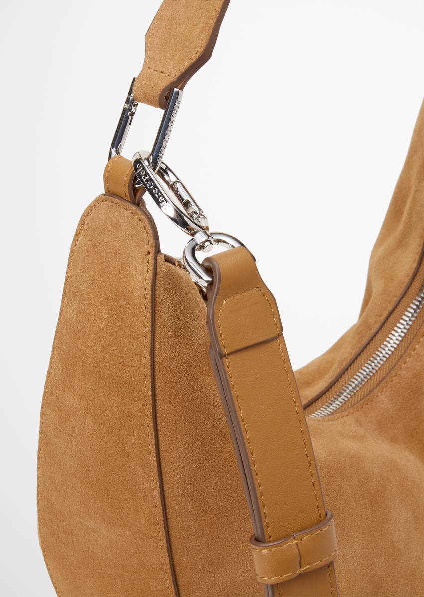 Crossbody bag small made from soft suede cowhide
