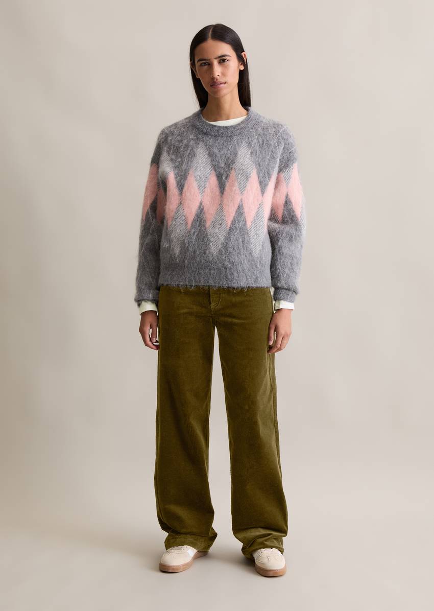 Relaxed knit sweater made from a cozy virgin wool and mohair blend