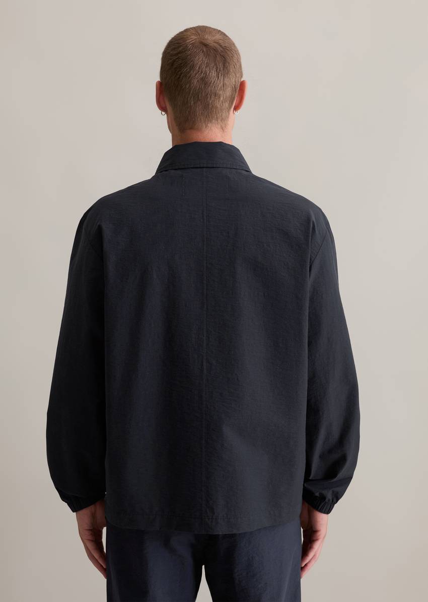 Coach jacket made from a textured organic cotton blend