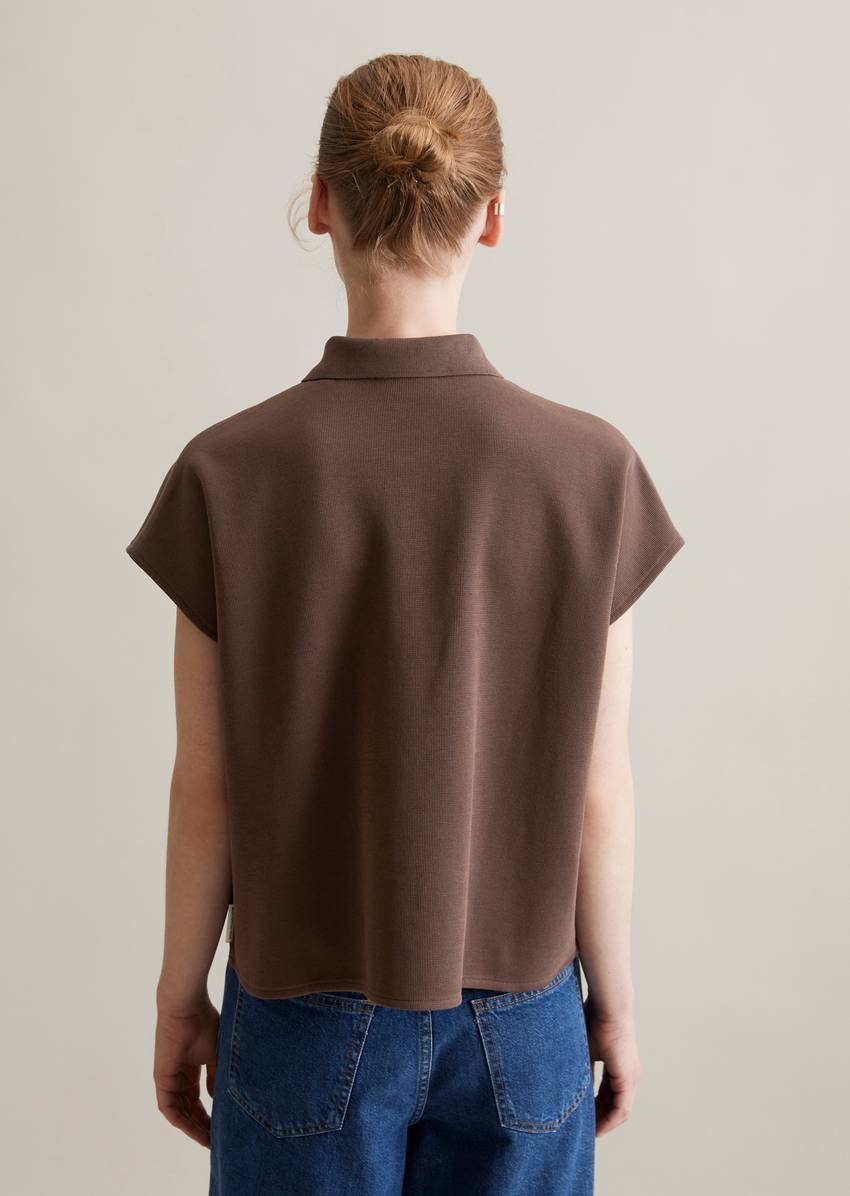 Sleeveless polo shirt wide made from organic cotton