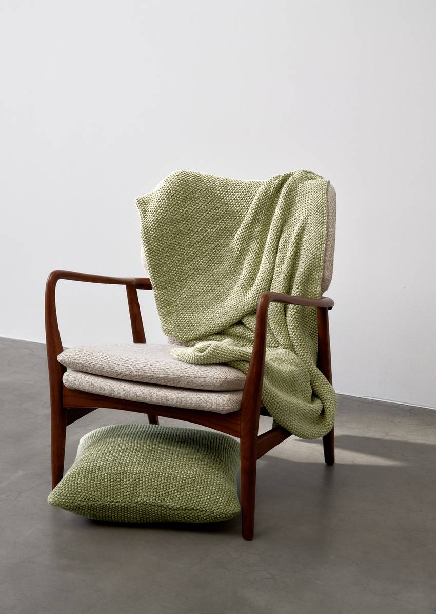 Plaid Model Nordic Knit melange made from soft organic cotton