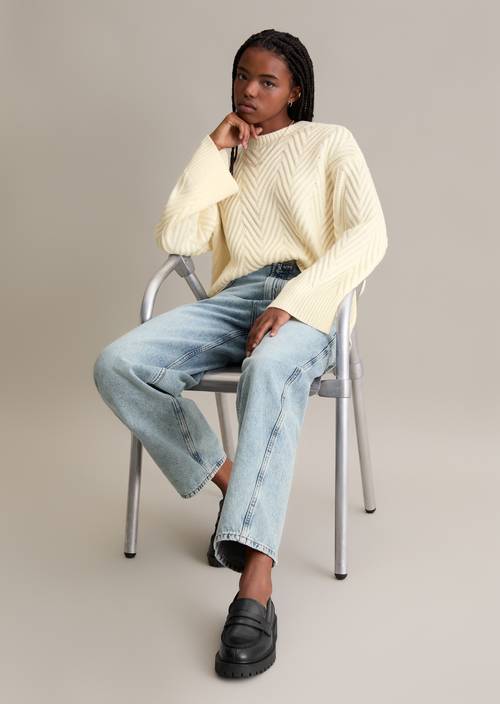 Relaxed knit sweater made from a soft virgin wool blend