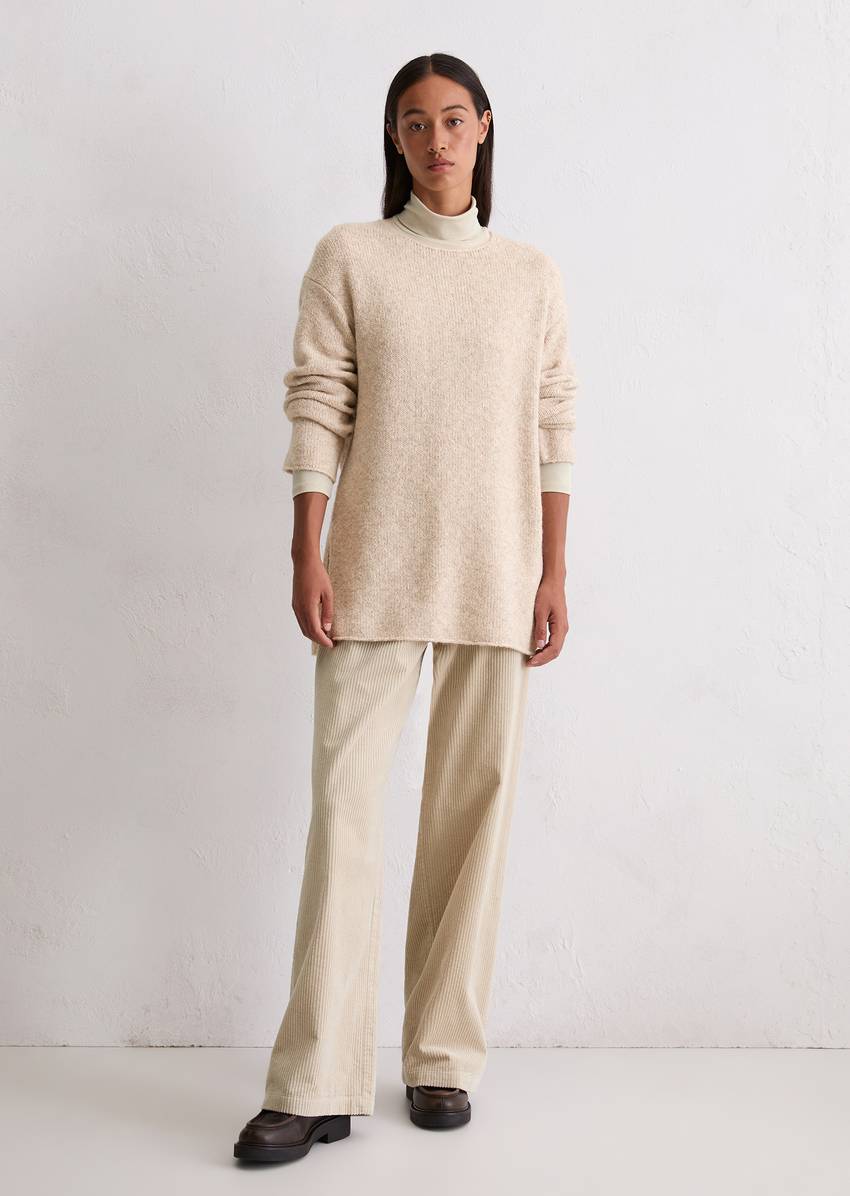 Sweater loose made from an organic cotton/alpaca/virgin wool mix