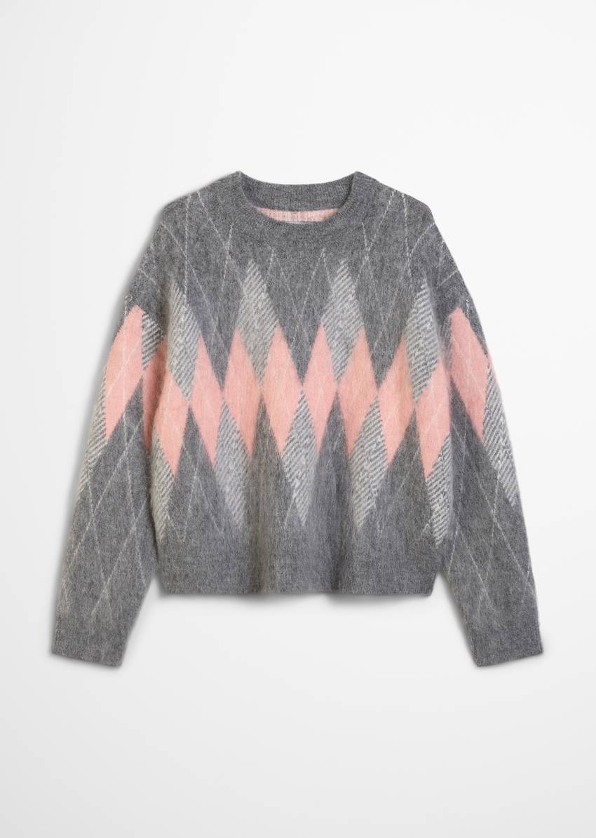 Relaxed knit sweater made from a cozy virgin wool and mohair blend