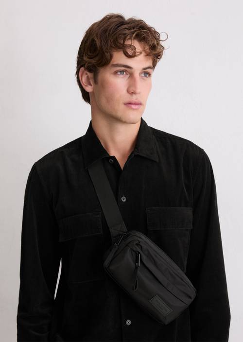 Fanny pack with outer compartment